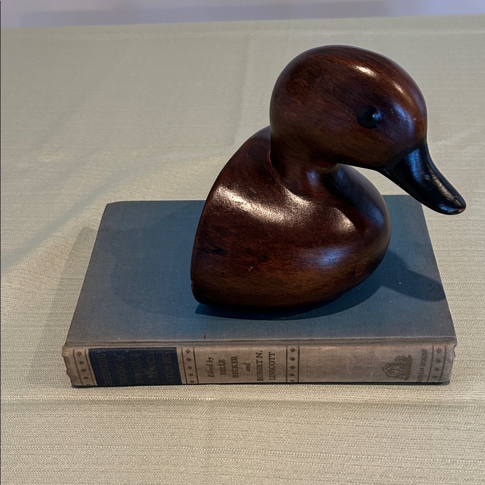 Vintage Wood Look Ceramic Duck Bookend with vintage 1945 Book.